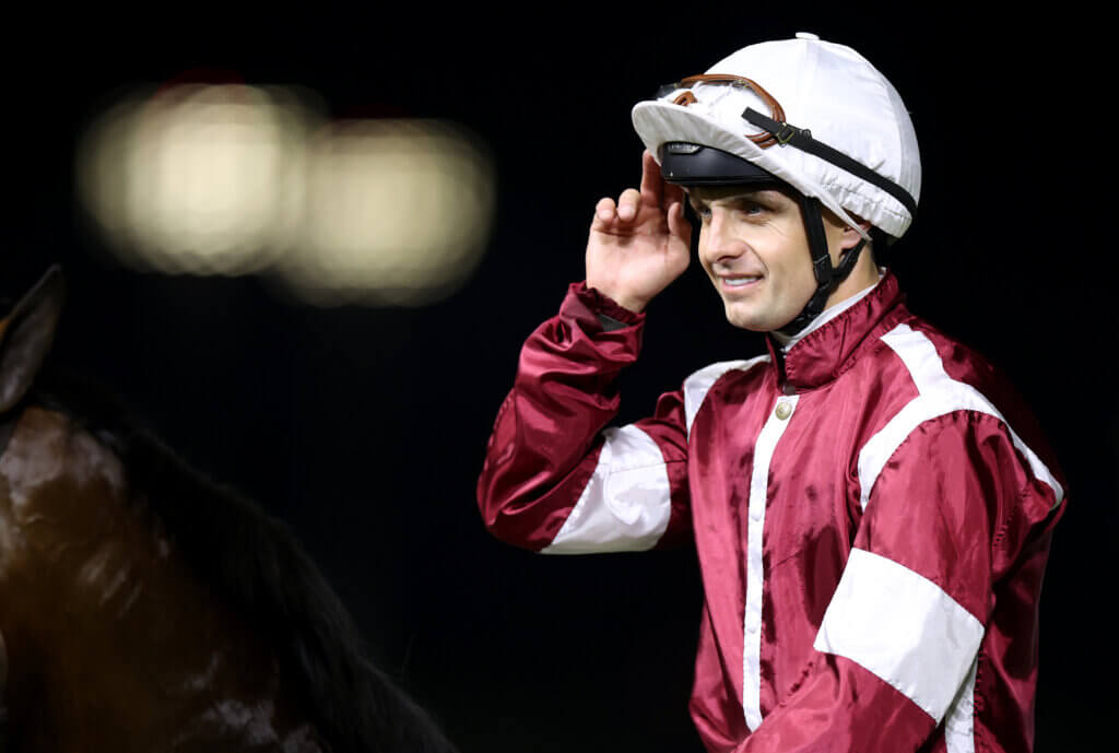 Connor Beasley saluting after a win on Golden Vekoma at Meydan