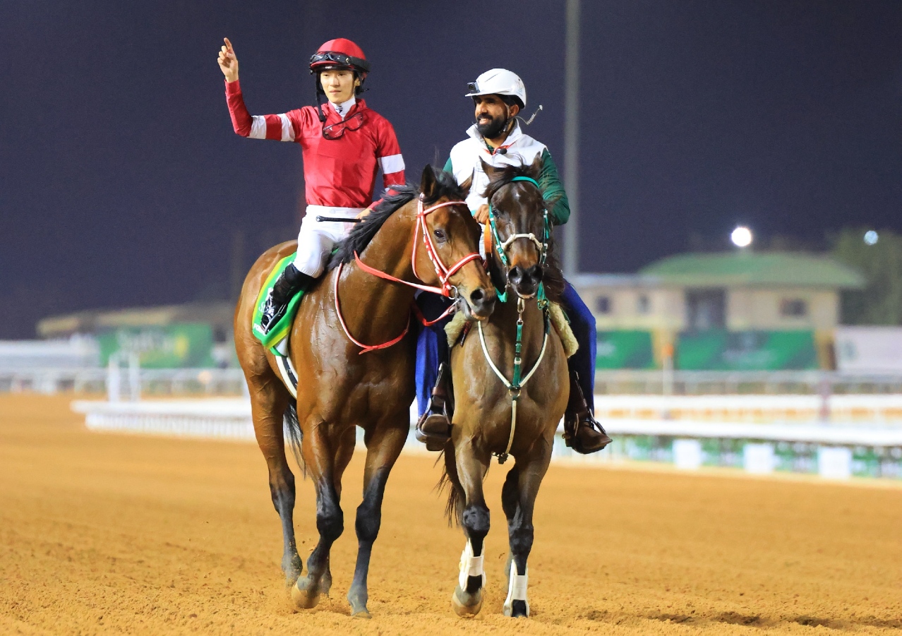 Ryusei Sakai being led back to scale after winning the Saudi Cup
