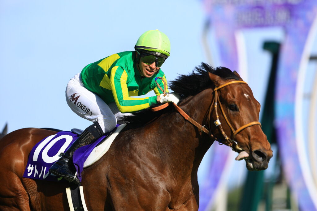 Joao Moreira and Satono Reve winning the G1 Takamatsunomiya Kinen