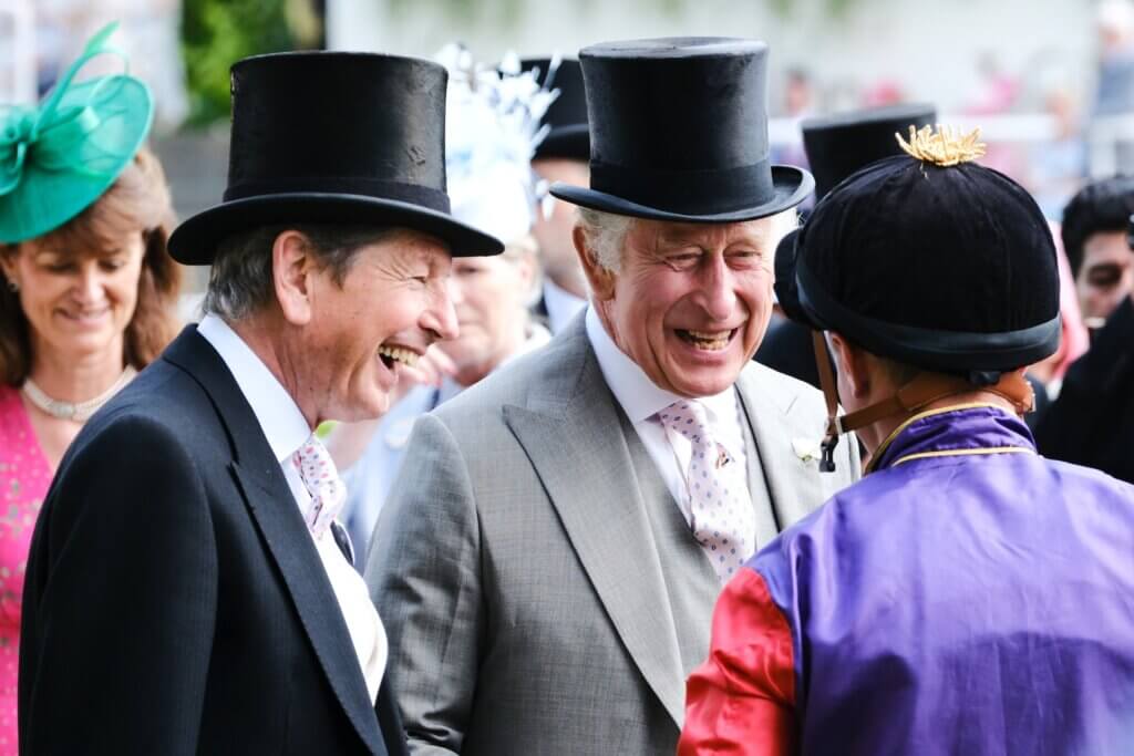 King Charles III enjoying a conversation with Tom Marquand at Royal Ascot