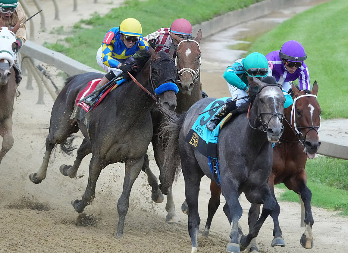 Umberto Rispoli and Journalism overcome a severe bumping duel to win the G1 Preakness Stakes at Pimlico