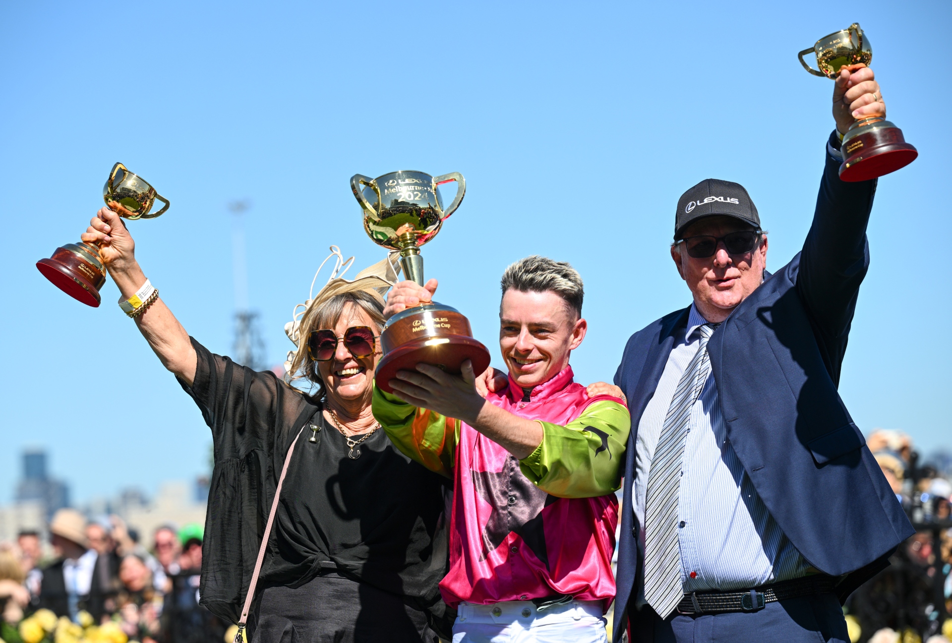 Trainers Sheila Laxon and John Symons, and jockey Robbie Dolan, celebrate Knight's Choice's Melbourne Cup win