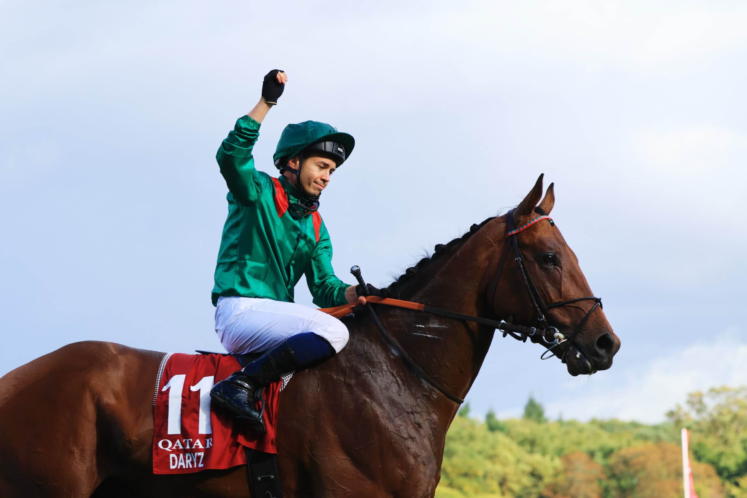 Daryz and Mickael Barzalona after winning the G1 Prix de l'Arc de Triomphe
