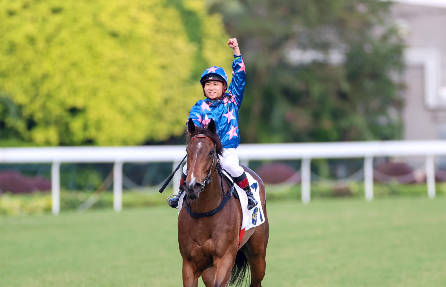 Dylan Mo and Winning Wing celebrating a win at Sha Tin