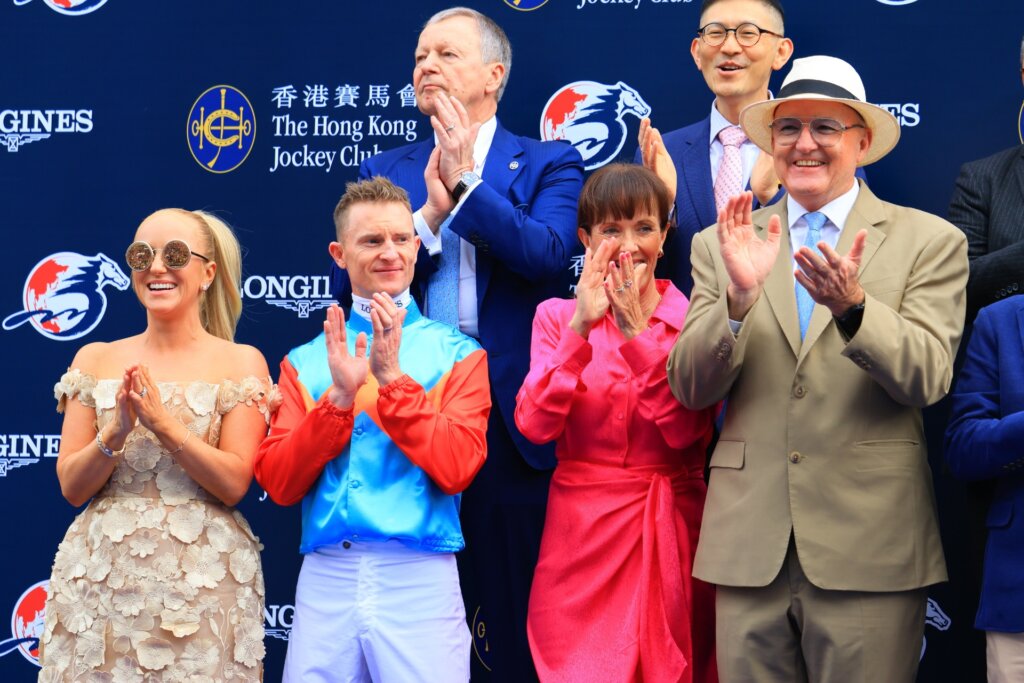 Zac Purton and David Hayes with their wives after G1 Hong Kong Sprint