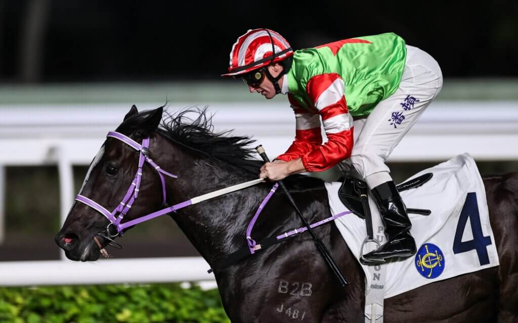 Zac Purton winning aboard Top Dragon at Sha Tin in October 2025