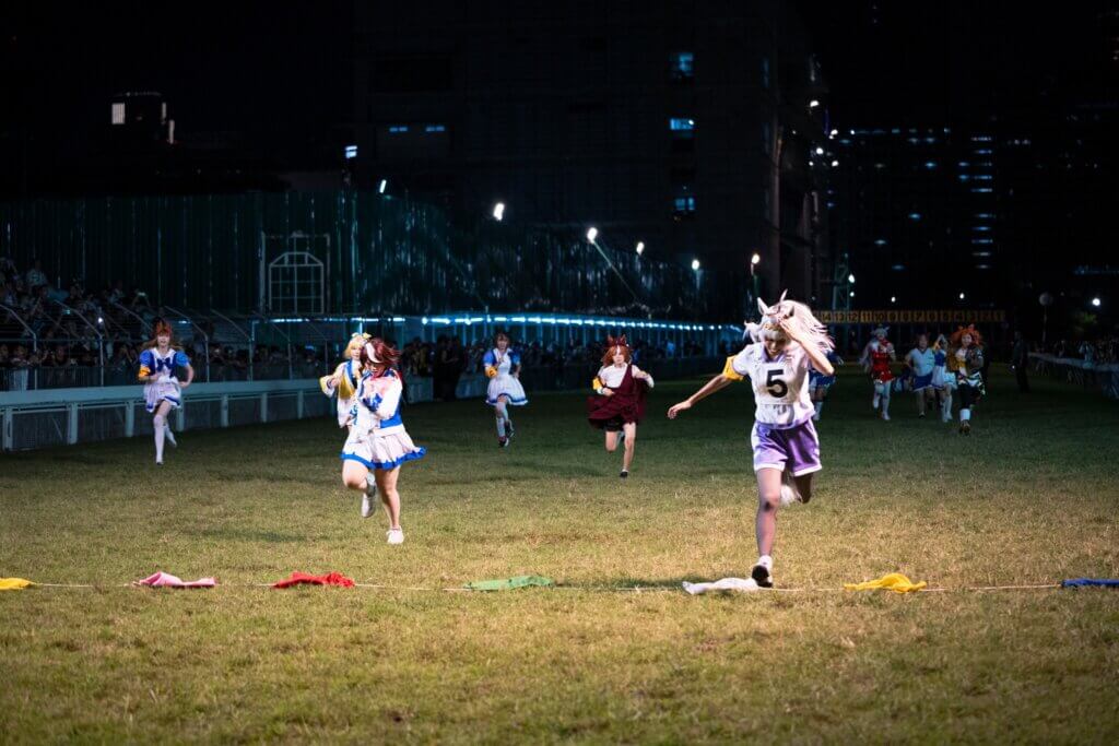 Umamusume fans engaged in a race at Royal Bangkok Sports Club