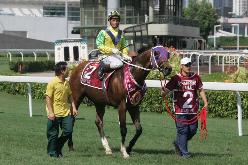 Gerald Mosse aboard Bullish Luck at Sha Tin