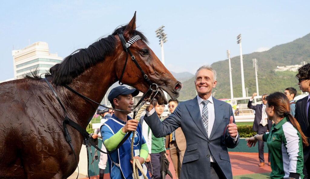 Mark Newnham celebrates after his first Hong Kong Derby win at Sha Tin