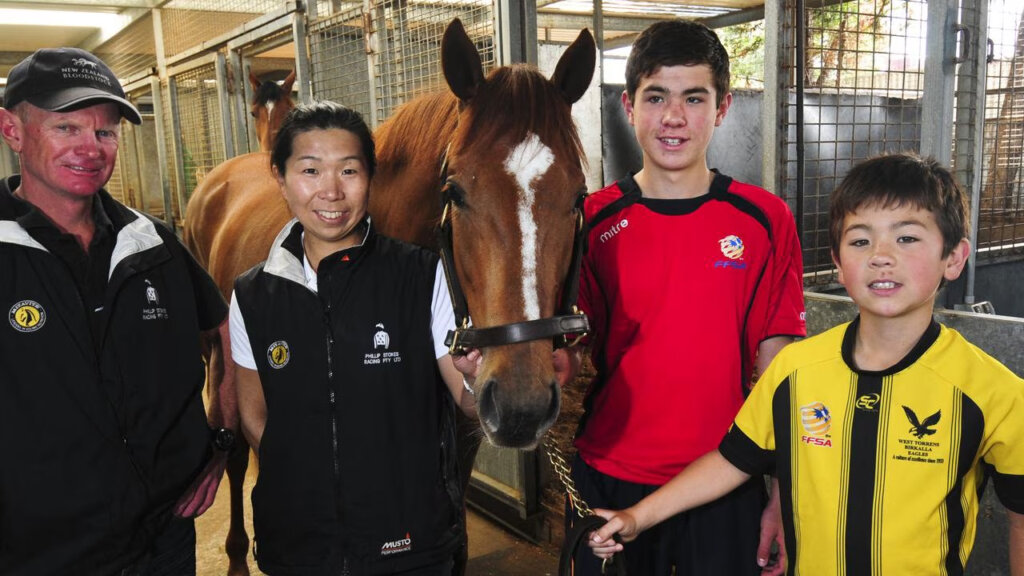 Phillip Stokes with wife Ayumi and sons Tommy and Kerrin