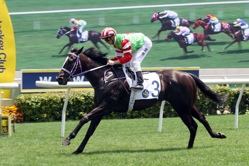 Top Dragon winning at Sha Tin under Zac Purton in April, 2025