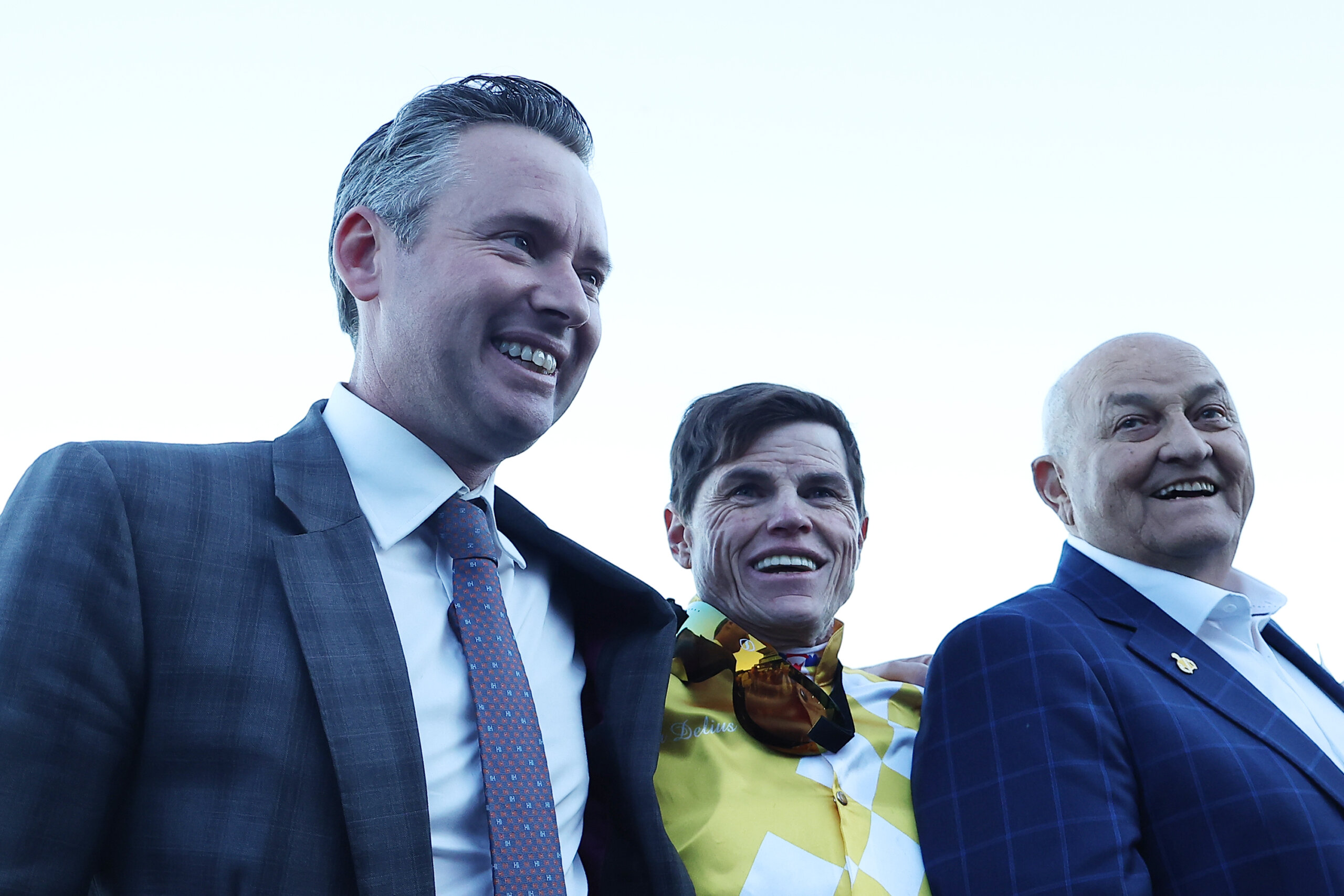 Sir Delius' co-trainer Adrian Bott with winning jockey Craig Williams and owner Sir Owen Glenn after their 2026 Queen Elizabeth at Randwick