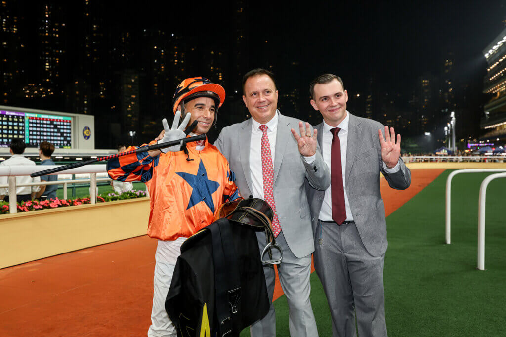 Joao Moreira and Caspar Fownes celebrate a Happy Valley four-timer