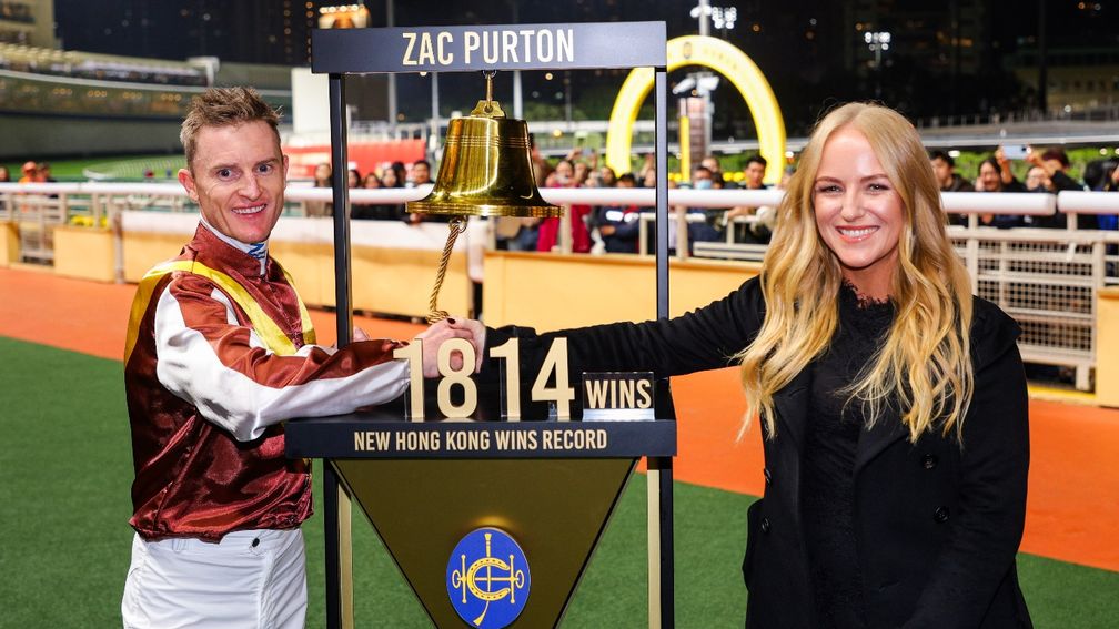 Zac and Nicole Purton ring the bell after Zac broke Douglas Whyte's HK wins record in early 2025