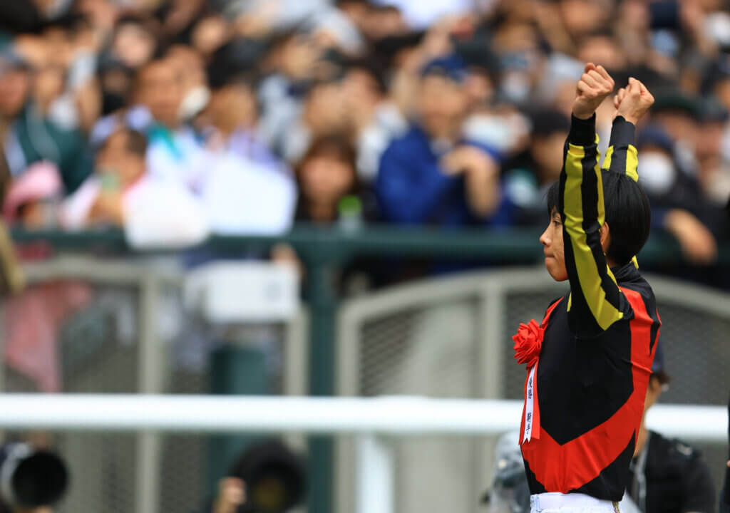 Yuichi Kitamura celebrating his Tenno Sho (Spring) win aboard Croix du nord