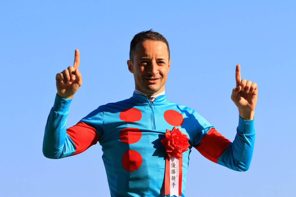 Christophe Lemaire celebrating his 100th G1 win after claiming the Victoria Mile on Embroidery