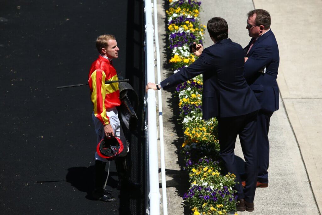Tommy Berry talking to trainer John O'Shea at Randwick in 2020