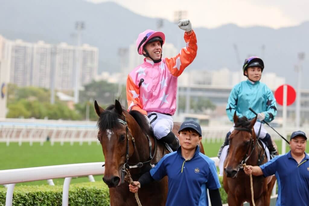 Brenton Avdulla celebrating a win on My Mars at Sha Tin