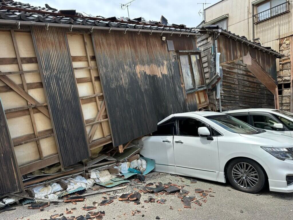 A car crushed by a structure in Suzu city due to the earthquake