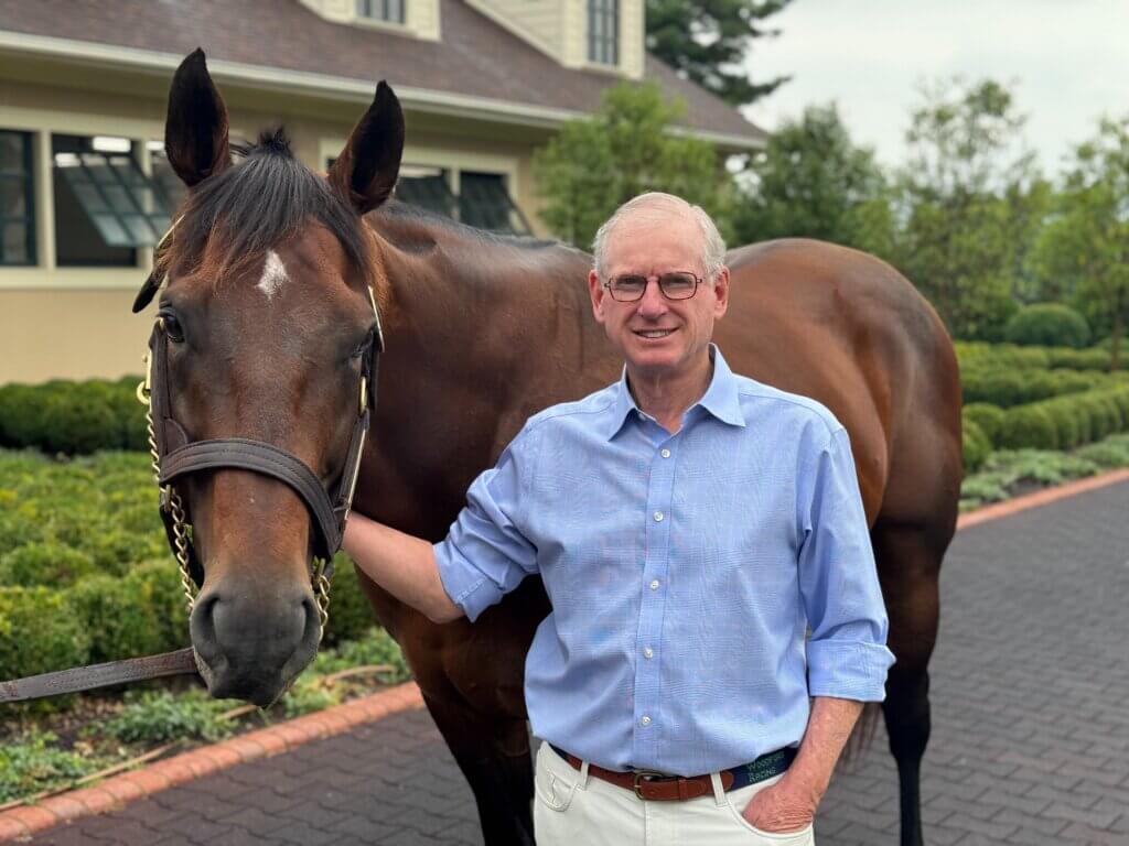 Lane's End Farm's general manager Bill Farish with Flightline
