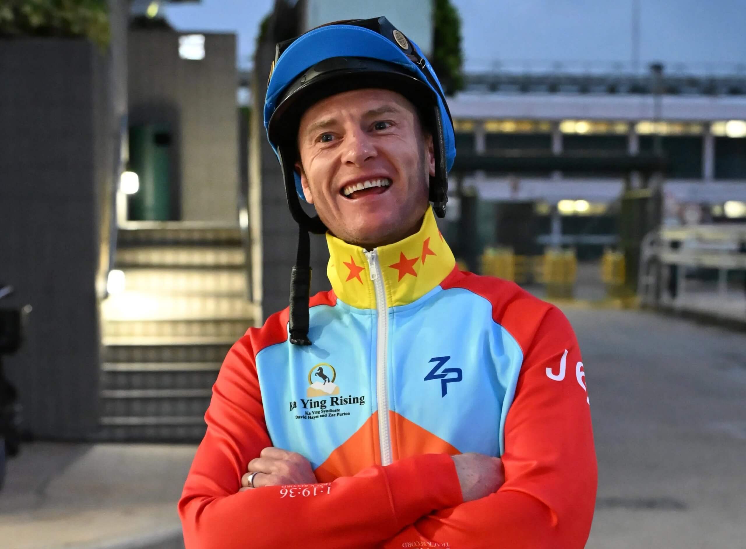 Zac Purton wearing his Ka Ying Rising jacket